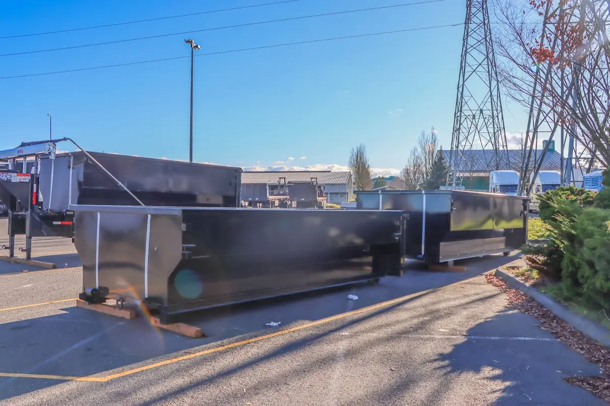 Roll-off dumpster ready for waste disposal at job site for Yard Waste Dumpster Rental in Riviera Beach